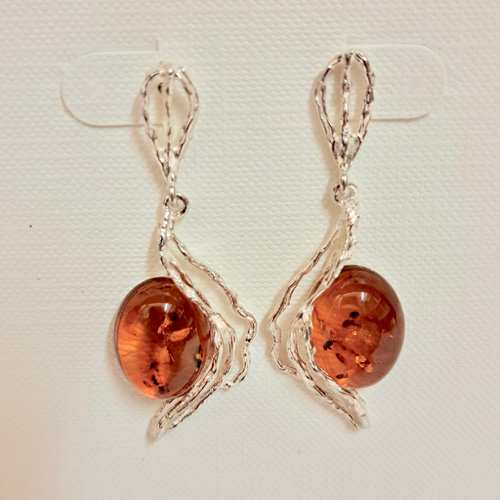 Click to view detail for HWG-2343 Earrings, Oval Rum Amber, with Silver Side Accent $55